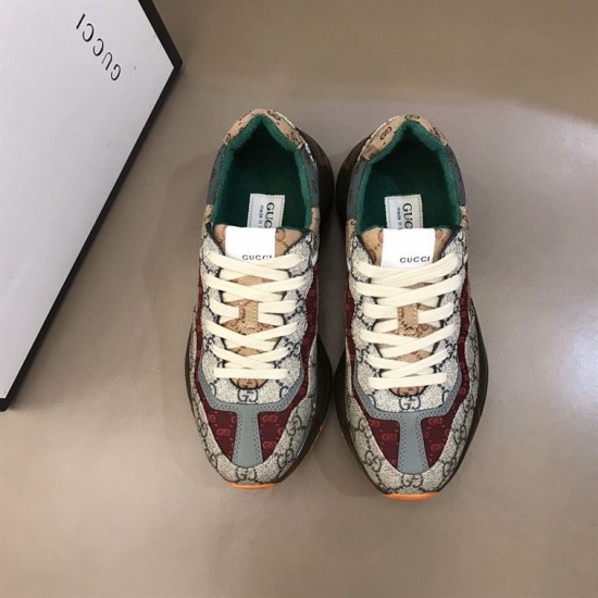Gucci GG Rhyton Low Top Trainers Overhead View in beige and brown Top-down overhead view of Gucci GG Rhyton Monogram Canvas Low Top Trainers with off-white laces in beige and brown