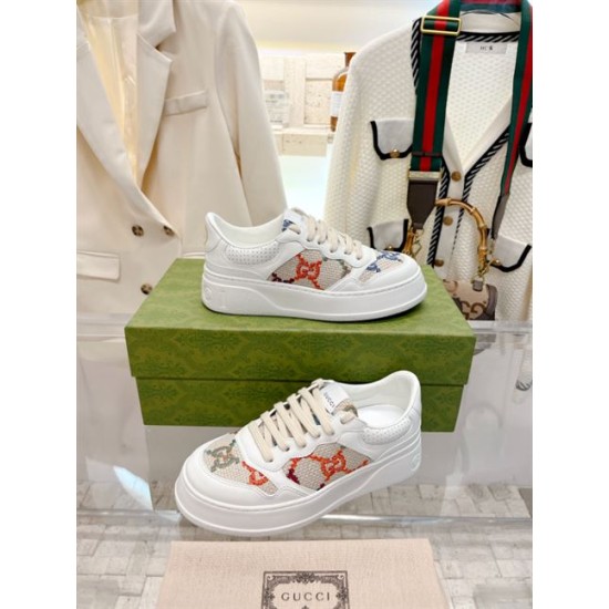 Gucci GG Monogram Canvas Leather Low Top Trainers Pair in off-white and multicoloured Gucci GG Monogram Canvas Leather Low Top Trainers pair angled display in off-white and multicoloured