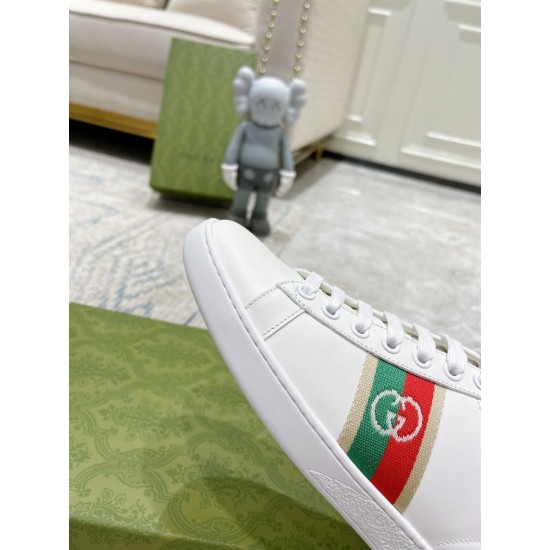 Gucci White Leather Trainer Toe Detail in white and red Close-up detail of smooth white leather toe box and stitched web stripe motif in white and red