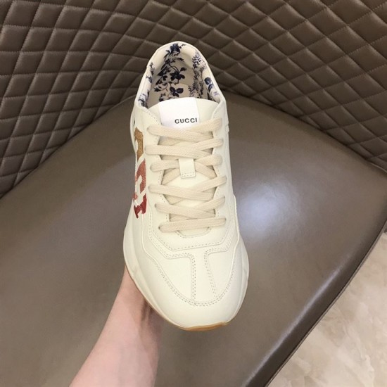 Gucci Rhyton Trainer Front Perspective in ivory Front and top perspective of Gucci Rhyton trainer toe box and tongue in ivory