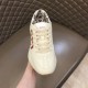 Gucci Rhyton Trainer Front Perspective in ivory Front and top perspective of Gucci Rhyton trainer toe box and tongue in ivory