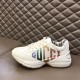 Gucci Rhyton Trainer Profile View in ivory Side profile of Gucci Rhyton trainer resting on display surface in ivory