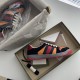 Gucci Screener Trainers In Black Suede And Orange Packaging Gucci Screener trainer in black suede and orange presented inside its product box.