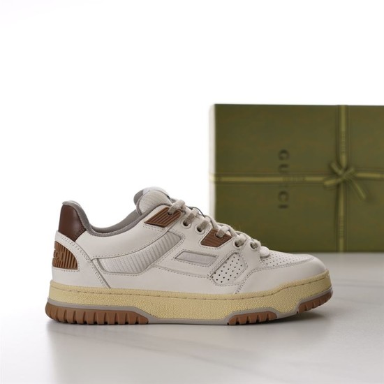 Lateral view of off-white Gucci trainer with brown eyelet accents