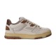 Side profile view of Gucci low-top leather trainer in off-white and brown