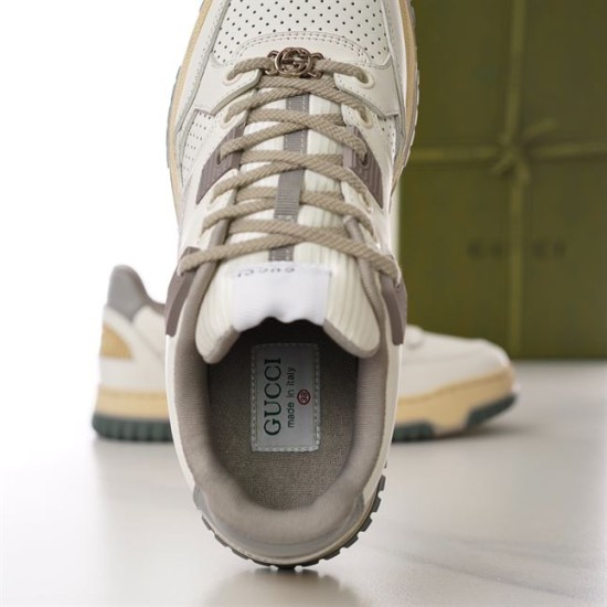 Gucci Off White Trainer Interior and Label Detail in off-white and grey Close-up interior view showing Gucci made in Italy inner label and grey padded lining in off-white and grey