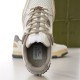 Gucci Off White Trainer Interior and Label Detail in off-white and grey Close-up interior view showing Gucci made in Italy inner label and grey padded lining in off-white and grey