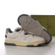 Gucci Trainer Sole Tread View in off-white and beige Gucci off-white trainer shown beside the treaded dark grey rubber outsole in off-white and beige