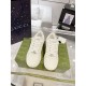 Top-down view of Gucci white leather perforated trainers
