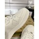 Close-up of perforated toe box on Gucci white leather trainer
