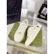 Pair of Gucci white low-top leather trainers displayed on box