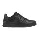 Side profile of Gucci low top trainer in black leather