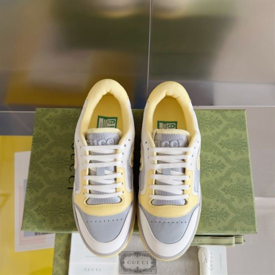 Frontal top-down view of Gucci Mac80 white grey yellow trainers