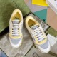 Top-down view of both Gucci Mac80 trainers showing laces and toe box details in white and grey