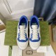 Gucci Mac80 Off White Blue Trainers Overhead View Overhead view of off-white and blue leather trainers displaying front laces and branded tongue tabs in off white and blue