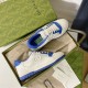 Gucci Mac80 Trainers Inside Packaging in off white and blue Open shoebox showing Gucci off-white trainers with blue accents, dust bag, and documentation in off white and blue