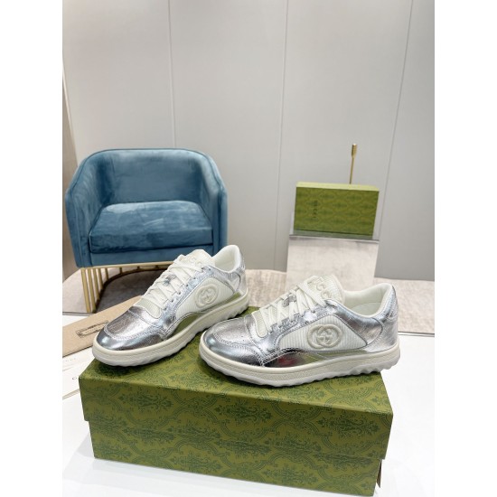 Gucci Mac80 Metallic Silver Trainers Front Angle View in silver and off-white Three-quarter front angle of Gucci Mac80 metallic silver and off-white trainers