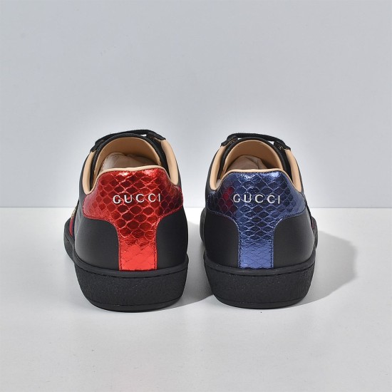 Gucci Men's Ace Bee Embroidered Black Leather Trainers - Back View Rear view of Gucci Men's Ace Bee Embroidered Black Leather Trainers showing metallic red and blue heels with brand logo