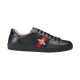 Gucci Men's Ace Bee Embroidered Black Leather Trainer - Profile View Profile view of Gucci Men's Ace Bee Embroidered Black Leather Trainer showcasing the side web stripe