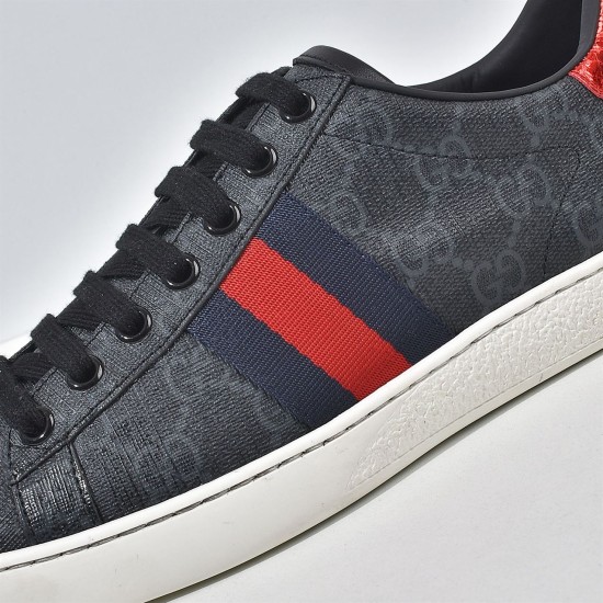 Close-up of web stripe detail and GG monogram canvas on black trainer