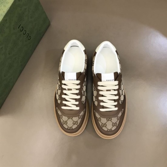 Gucci GG Supreme Brown Trainers Top-Down View in brown and white Top-down view of Gucci brown leather and GG Supreme canvas trainers with cream laces in brown and white