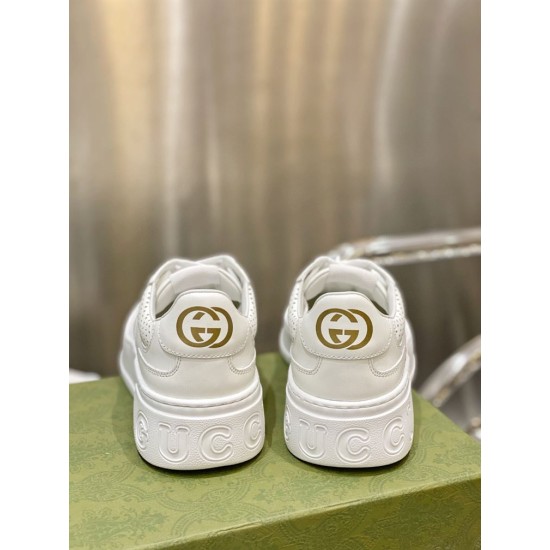 Gucci White Trainer Heel Detail Rear view highlighting gold-tone GG heel tabs and thick white platform soles