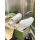 Gucci White Platform Trainers Angle View Side angled view of both Gucci white leather trainers displayed with shoe box