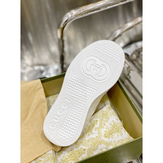 Gucci White Trainer Sole Pattern Underside tread pattern of white rubber sole featuring Gucci branding