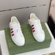 Gucci White and Red Leather Trainers Pair Pair of Gucci white leather trainers with red accents displayed on a green box.