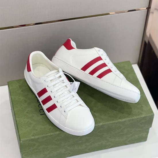 Gucci White Trainers Elevated View in white and red Top and side view of Gucci white leather trainers with red accenting on green box.