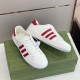 Gucci White Trainers Elevated View in white and red Top and side view of Gucci white leather trainers with red accenting on green box.