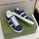 Gucci Men's GG Blue Denim Trainers Pair Angled View Angled pair arrangement of Gucci Men's GG Blue Denim Low-Top Trainers on branded packaging
