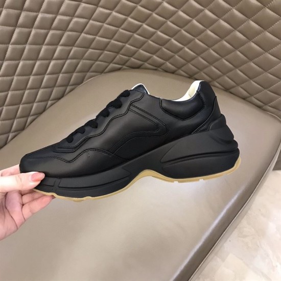 Gucci Rhyton Tiger Print Leather Trainer Medial View in black Medial side profile of black leather Gucci Rhyton trainer showing chunky sole