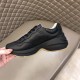 Gucci Rhyton Tiger Print Leather Trainer Medial View in black Medial side profile of black leather Gucci Rhyton trainer showing chunky sole