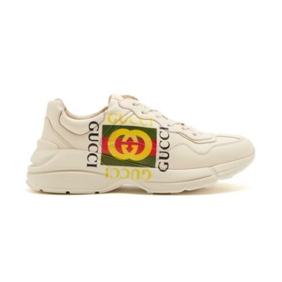 Gucci Rhyton Ivory Leather Trainer Studio View Gucci Rhyton Ivory Leather Trainer profile on plain background