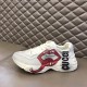 Gucci Rhyton Mouth Graphic Profile in off white Side profile of off white Gucci trainer showing red lips and black lettering