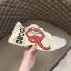 Gucci Rhyton Mouth Print Trainer In Hand in off white Off white Gucci mouth print trainer displayed in hand against neutral backdrop