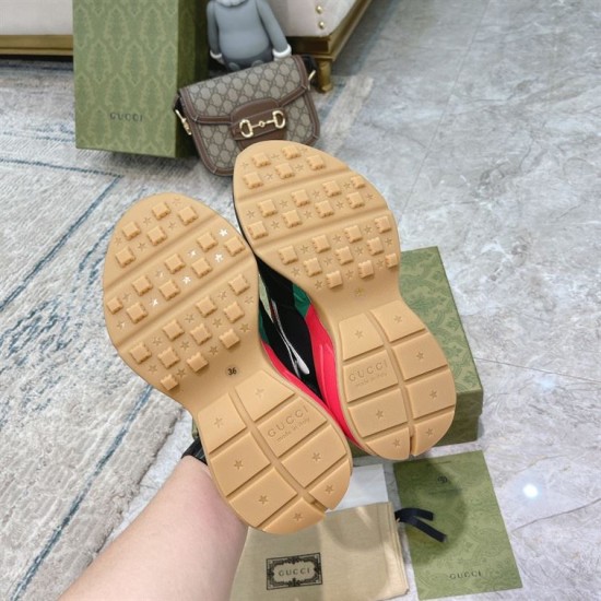 Gucci Rhyton Trainer Sole Tread Pattern in black and red Underside view showing gum rubber outsoles with star patterns on Gucci Rhyton trainers in black and red