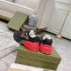 Gucci Rhyton Trainers Heel View in black and red Rear angle view of Gucci Rhyton trainers showcasing red heel counter and white collar lining in black and red