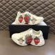 Gucci Rhyton Strawberry Trainers Pair View in ivory and red Pair of Gucci Rhyton ivory trainers with strawberry graphics shown with shoe box in ivory and red