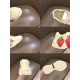 Gucci Rhyton Trainer Close-Up Details Collage in ivory and red Six collage close-ups of Gucci Rhyton trainer toe box, tongue, heel, and outsole in ivory and red