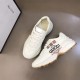 Angled View of Gucci Rhyton White Leather Trainers Angled top view of Gucci Rhyton White Leather Trainers pair