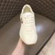 Top-Down View of Gucci Rhyton Worldwide Flag Printed White Leather Trainer Top-down front view of Gucci Rhyton Worldwide Flag Printed White Leather Trainer