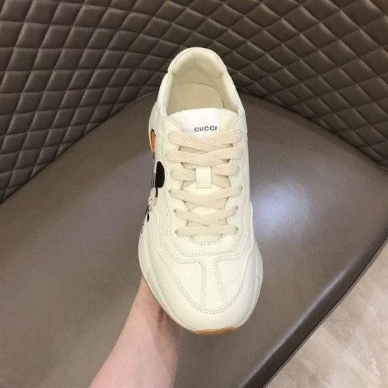 Gucci x Disney Rhyton Single Trainer Top View in ivory Top-down view of Gucci x Disney Rhyton single trainer with tongue branding in ivory