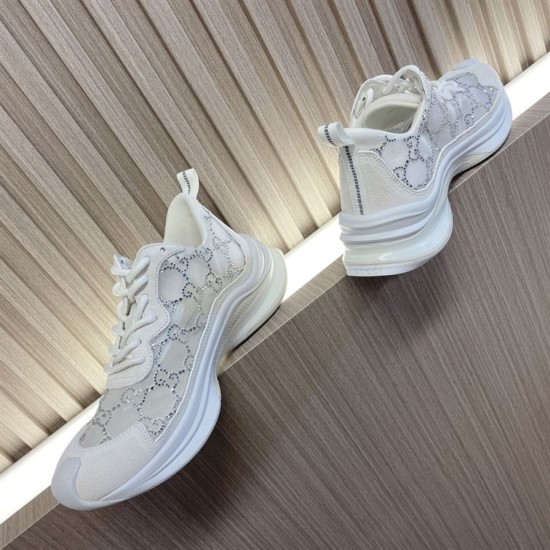 Gucci Run GG Crystal White Trainers Dual View Side profile of two Gucci Run GG crystal embellished white mesh trainers on display