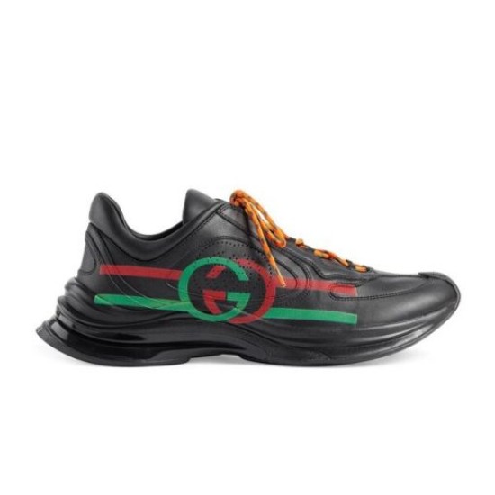 Gucci Black Leather Trainers Lateral Profile Lateral side profile of Gucci Black Leather Interlocking G Side-Stripe Trainers