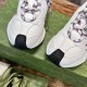 Gucci Run Leather Side-Stripe Trainers Off White close-up view of front black rubber toe wraps in off white and red