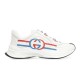 Gucci Run Leather Side-Stripe Trainers Off White lateral side view showing red and blue stripe graphics