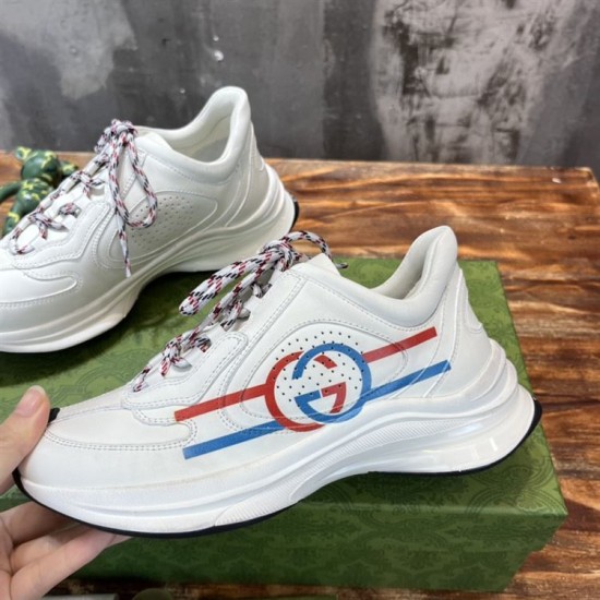 Gucci Run Leather Side-Stripe Trainers Off White side view showing interlocking GG side print and laces in off white and red