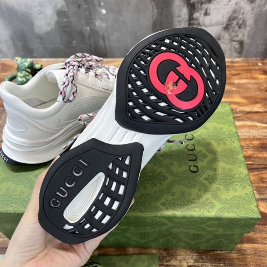 Gucci Run Leather Side-Stripe Trainers Off White bottom outsole showing black tread and red logo motif